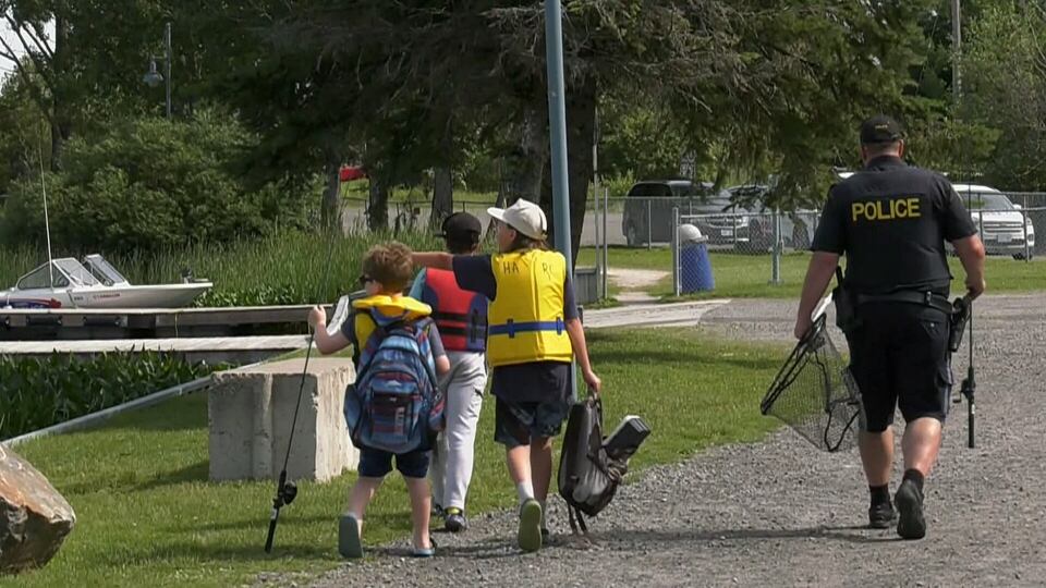 Cops, kids come together in Sudbury for some fishing