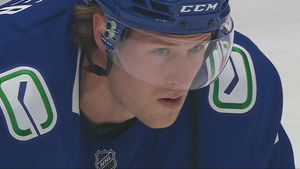Last-minute deal keeps Boeser in Vancouver